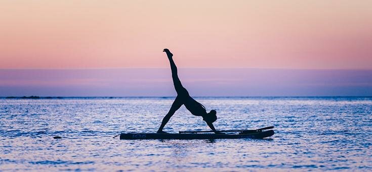 Stand Up Paddle boarding yoga